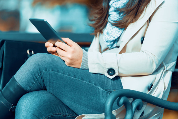 Woman using her digital tablet - Foto, imagen