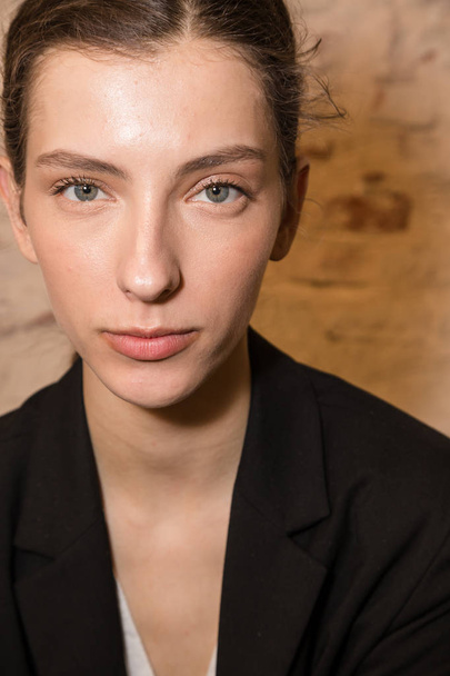 Gorgeous model in the backstage at Cividini show - Photo, Image