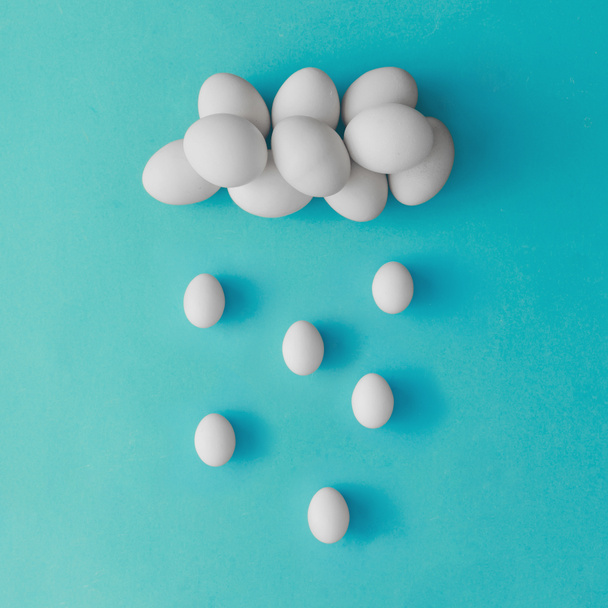 Cloud and rain made of easter eggs  - 写真・画像