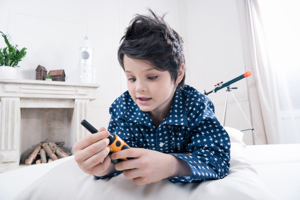 Boy using walkie-talkie  - Photo, Image