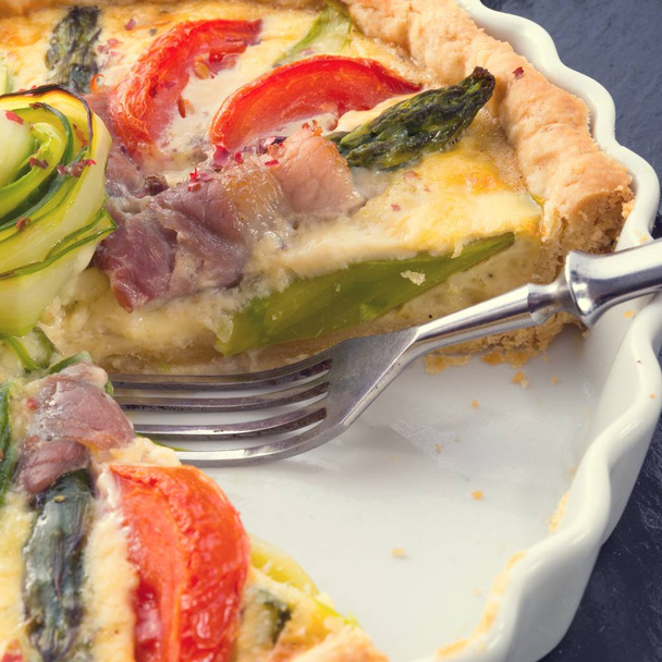 Close-up view of delicious baked asparagus tart on plate - 写真・画像