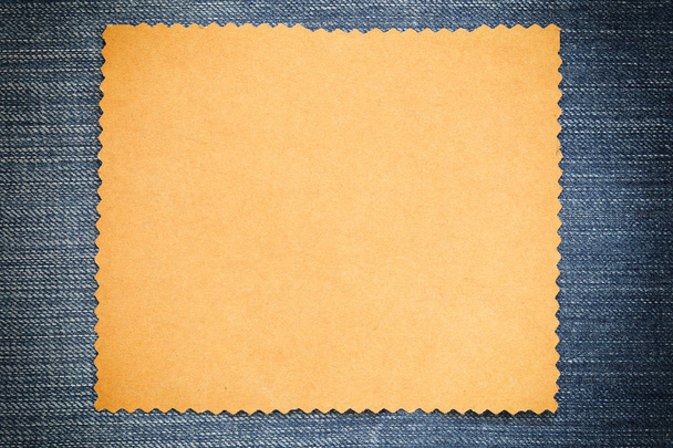 Brown cardboard of empty and copy space on Denim background,You can input the message text in picture. - Foto, afbeelding