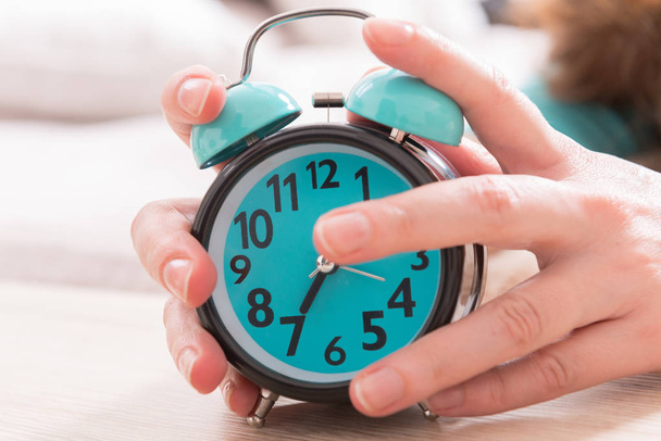 Hands on the alarm clock - Photo, Image