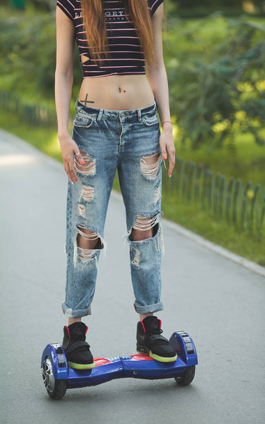 fit woman riding hoverboard - 写真・画像