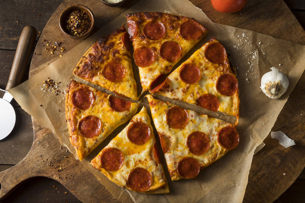 Cheap Greasy Frozen Pepperoni Pizza - Photo, Image