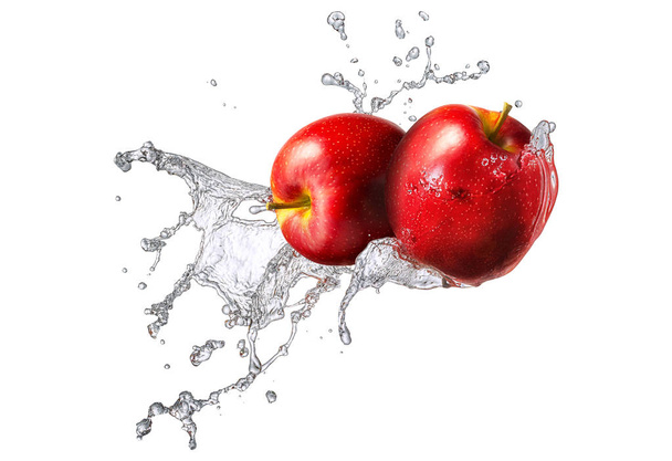 Water splash with apple isolated - 写真・画像