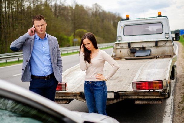 Couple near broken car on a roadside - Photo, Image