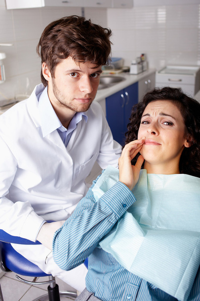Zahnarzt mit seinem Patienten - Foto, Bild