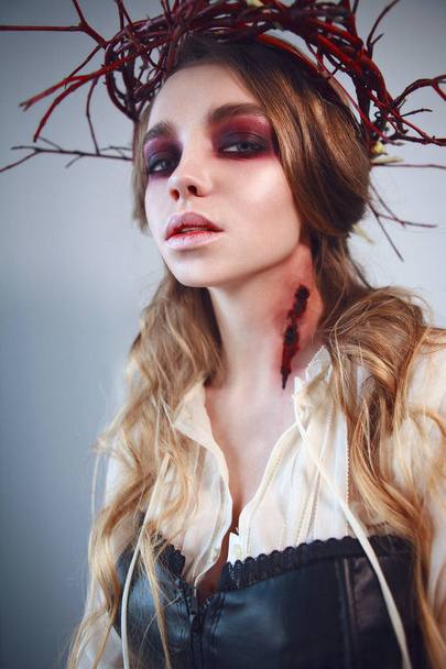 Close-up portrait of girl with fx make-up of vampire - Valokuva, kuva