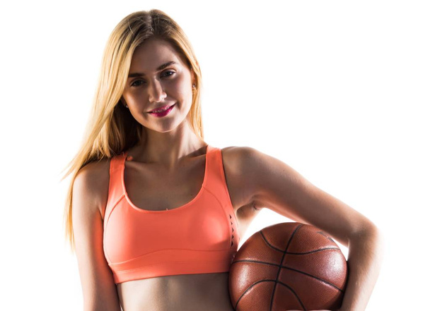 Блондинка грає в баскетбол
 - Фото, зображення