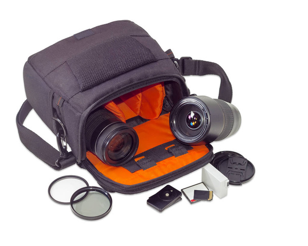 Bolso de la cámara, lentes de fotos y algunos otros accesorios de fotos
 - Foto, imagen