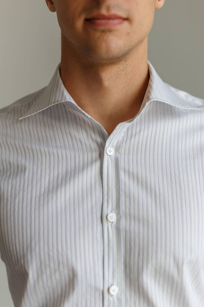 White shirt on the businessman. Unbuttoned collar. - Fotografie, Obrázek