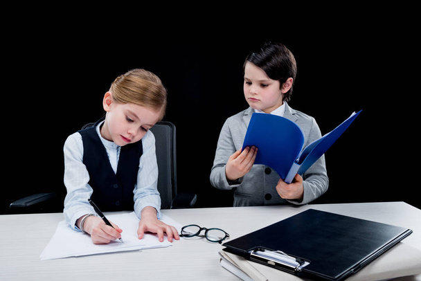 Children working with documents  - Фото, изображение