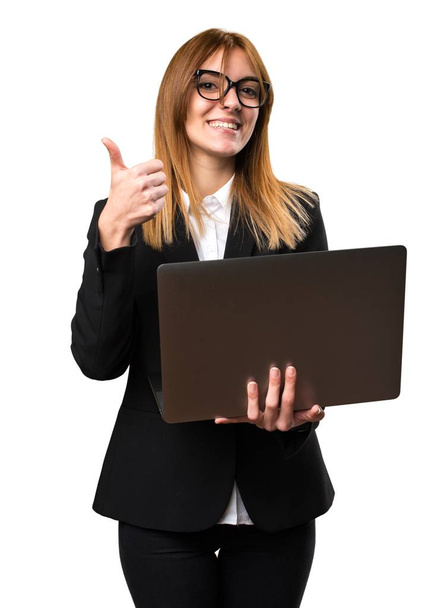 Young business woman with laptop - Foto, Imagem