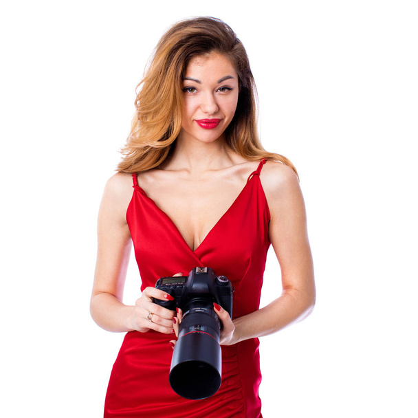 Happy photographer woman holding camera, isolated on white backg - Foto, afbeelding