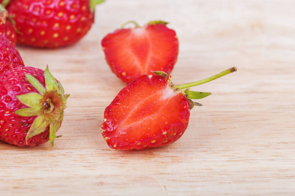 Fresh ripe strawberry on wood - Photo, image