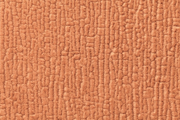 Оранжевый бледный фон мягкой, мимолетной ткани. Текстура текстильного крупного плана
 - Фото, изображение