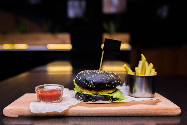 Burger with fries and ketchup - Valokuva, kuva