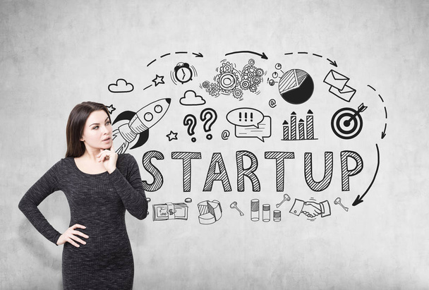 Woman in dress and startup on concrete - Photo, Image