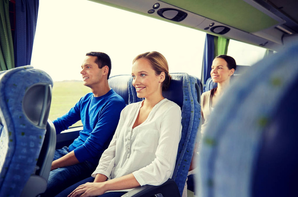 group of happy passengers in travel bus - Fotó, kép