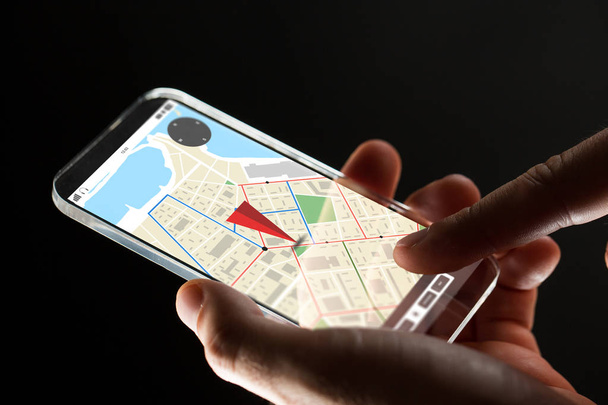close up of hand with gps map on smartphone - Valokuva, kuva