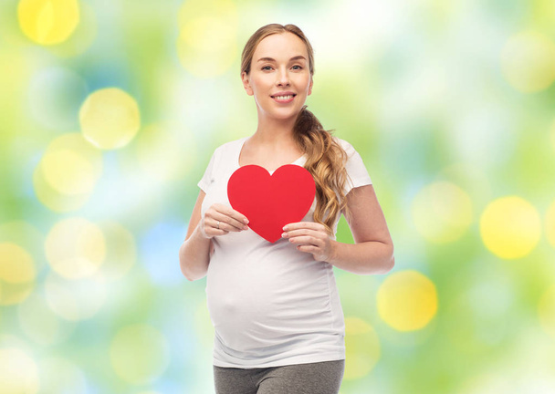 happy pregnant woman with red heart - Fotoğraf, Görsel