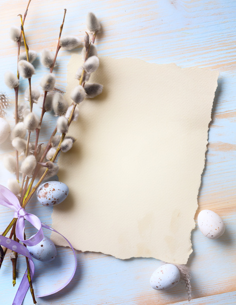 Easter background with Easter eggs and spring flowers. Top view  - Photo, Image