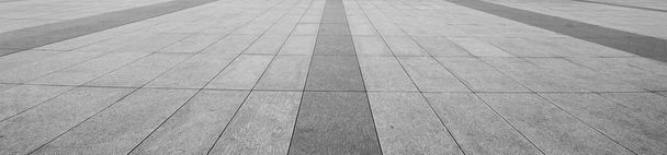 Perspective View of Monotone Gray Brick Stone on The Ground for Street Road. Sidewalk, Driveway, Pavers, Pavement in Vintage Design Flooring Square Pattern Texture Background - Photo, Image