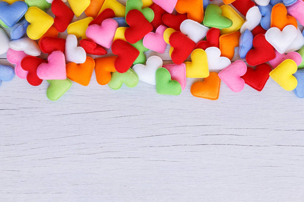 Colorful heart shape on white wooden plank background. For love  - Foto, Imagem