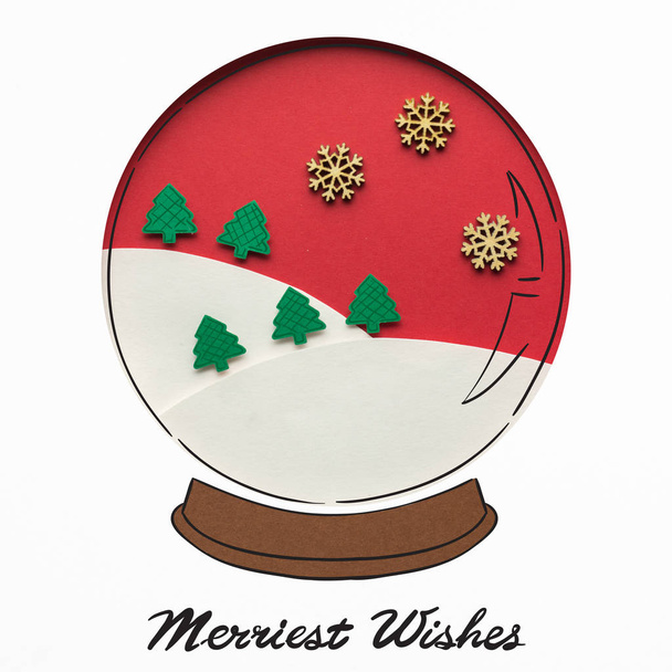 Merry wishes. Creative concept photo of a christmas ball made of paper on white background. - Photo, Image
