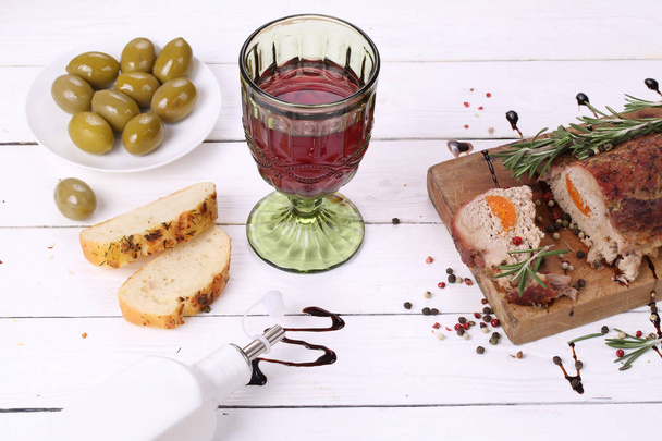 Baked ham with red wine on wooden background - Photo, image