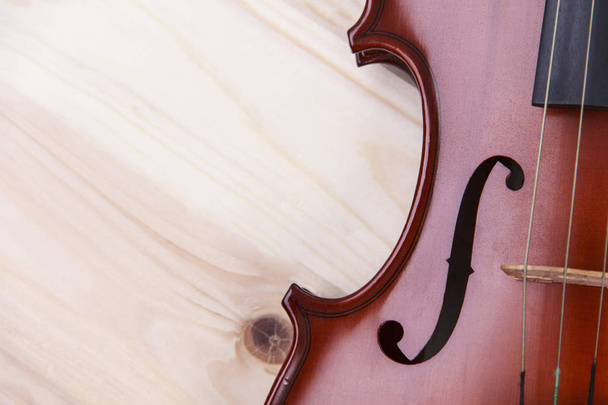 violin on wooden background - 写真・画像