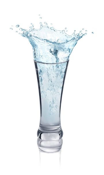 Splash of water in a glass on a white background - Foto, Bild
