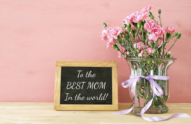 Mothers day concept. Bouquet of Carnation flowers in the vase - Foto, immagini