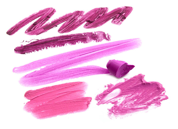 Collection of smudged lipsticks isolated on white - Photo, Image