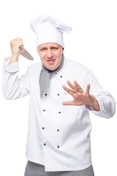 Κάθετη πορτρέτο του ένα τρελό επιθετική σεφ σε ένα λευκό backgro - Φωτογραφία, εικόνα