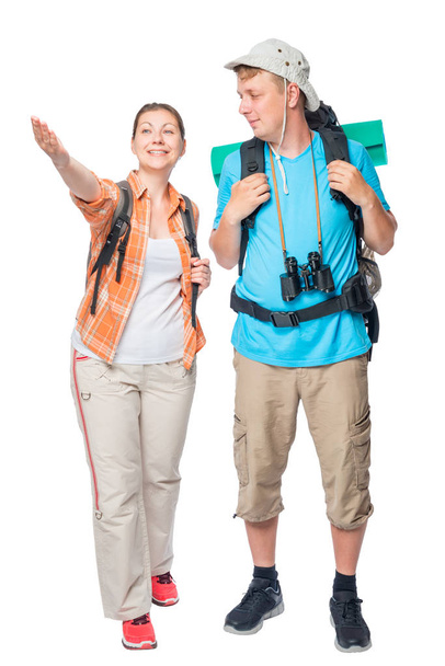 Happy couple of tourists with backpacks on a white background in - Foto, Bild