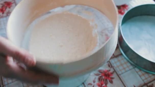 A woman sifts the flour through a sieve - Footage, Video
