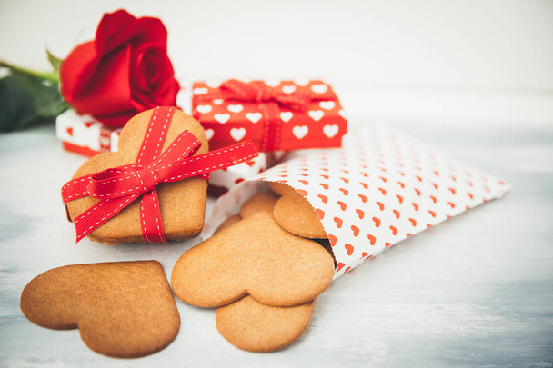 Heart Shaped Gingerbread Cookies on Wooden Table - Photo, image