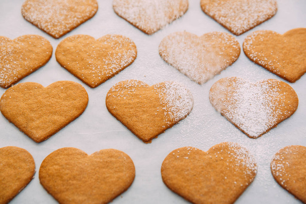 Heart Shaped Gingerbread Cookies on Wooden Table - Фото, изображение