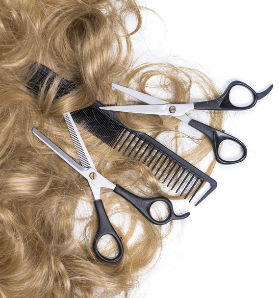 Hairdressing scissors with blonde hai - Фото, изображение