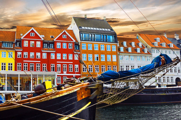 Yacht and color buildings in Nyhavn in the old center of Copenhagen - Photo, Image