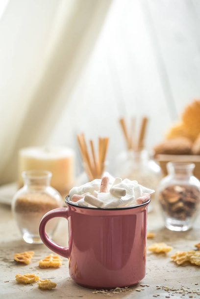 a delicious Cup of cocoa with colorful marshmallows - Photo, Image