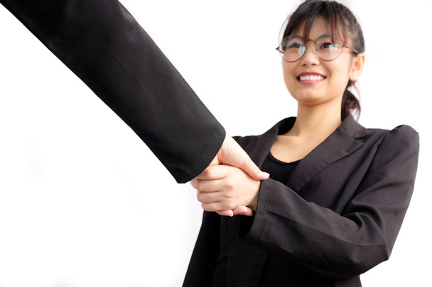 Asian business women shake hand with partner job success - Foto, Imagen
