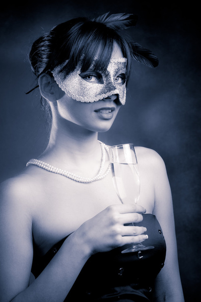 Maschera e champagne
 - Foto, immagini