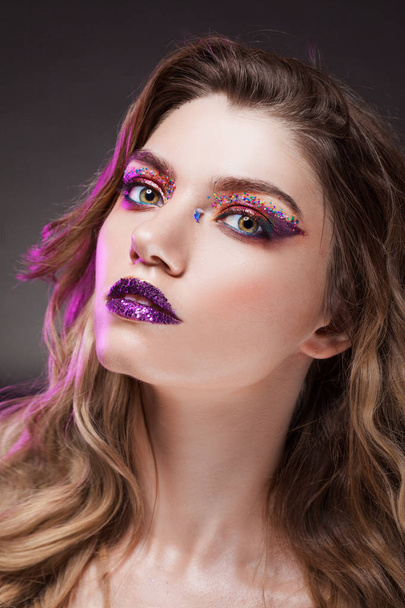 Young beautiful girl with creative make up. Attractive blonde, close-up - Foto, Imagem