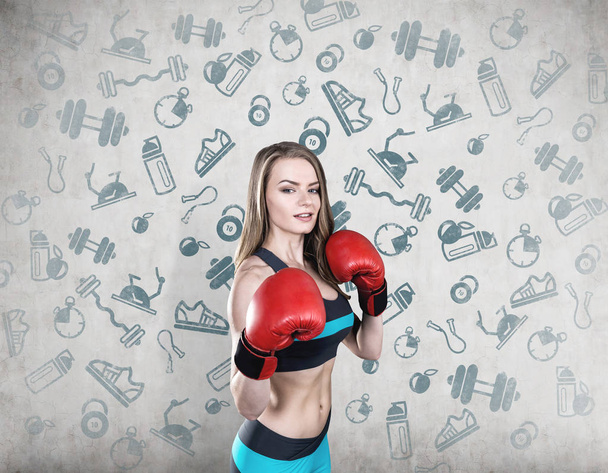 Woman boxer in blue and sport icons - Φωτογραφία, εικόνα