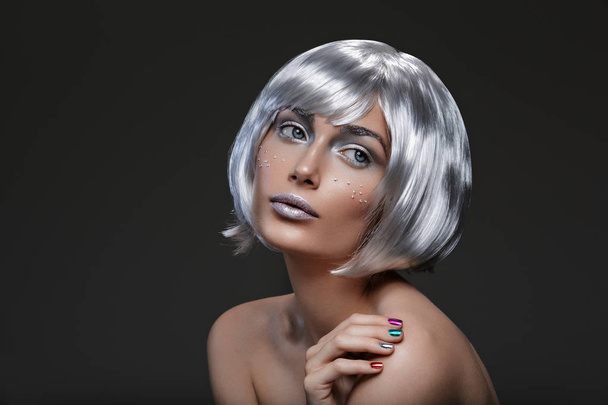 Beautiful girl in silver wig - Photo, Image