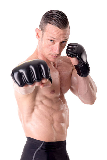 fighter posing with gloves - Foto, afbeelding