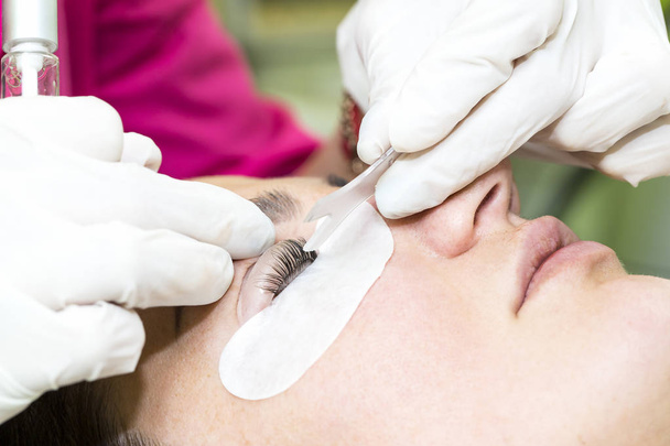 procedure for eyelash extensions, eyelashes lamination  - Valokuva, kuva